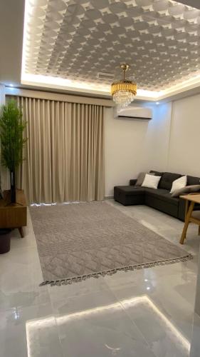 Posezení v ubytování Al Reef Apartment