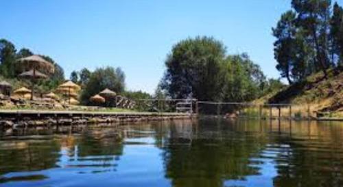 a view of a body of water with a zoo at Alojamiento Rural Manomar in Torre de Don Miguel