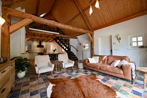 Χώρος καθιστικού στο Warm, authentiek huis in landelijke omgeving