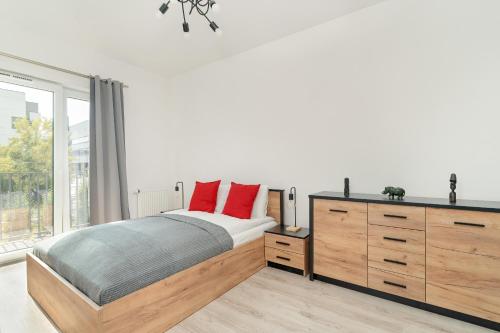 Posteľ alebo postele v izbe v ubytovaní Przestronny Apartament Blisko Jeziora w Poznaniu 2 Miejsca Postojowe by Noclegi Renters