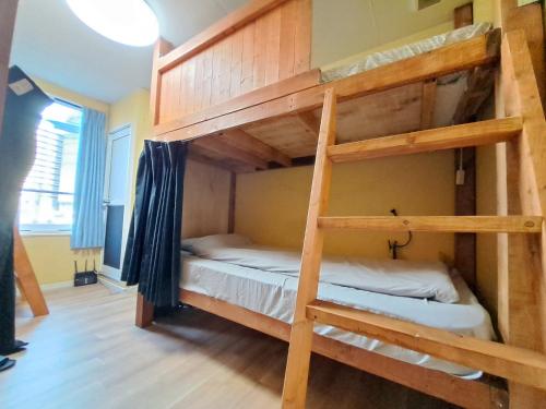 Katil atau katil-katil dalam bilik di Fukuoka Tabiji Hostel & Guesthouse