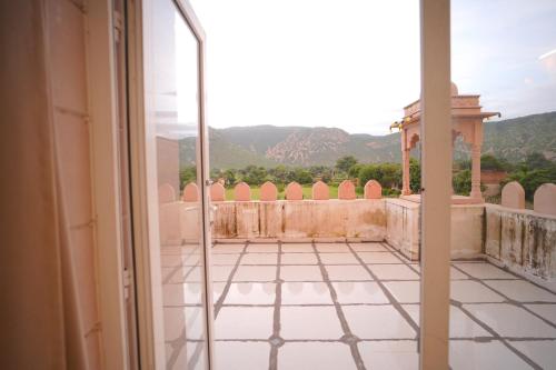 a view from the balcony of a house at Dhawala Resort By Aamod in Alwar