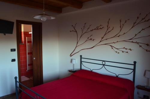 Ein Bett oder Betten in einem Zimmer der Unterkunft Agriturismo Ra Nissora