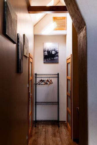 a hallway in a house with hangers at Apartament nad Potokiem Sauna, Jacuzzi, SPA in Witów