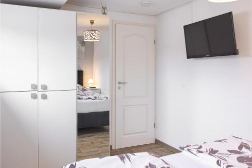 Ferienwohnung Leipzig Südにあるベッド