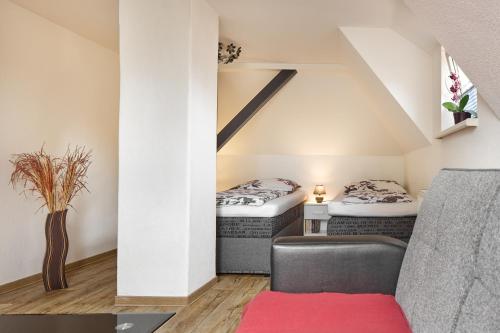 Postel nebo postele na pokoji v ubytování Ferienwohnung Leipzig Süd
