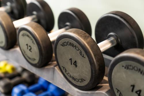 a row of dumbbells on display in a gym at Crowne Plaza Newcastle - Stephenson Quarter by IHG in Newcastle upon Tyne