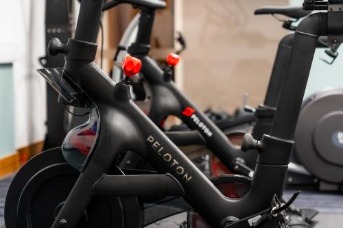 a row of exercise bikes in a gym at Crowne Plaza Newcastle - Stephenson Quarter by IHG in Newcastle upon Tyne