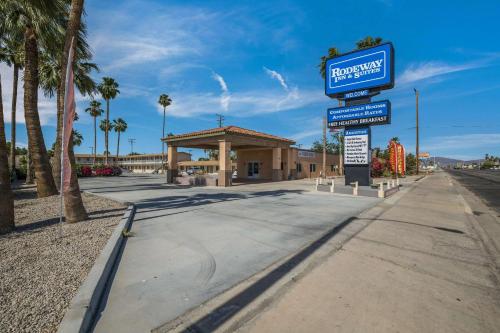 a street sign in front of a gas station at Rodeway Inn & Suites Blythe I-10 in Blythe