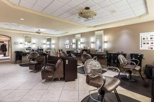 a salon with a lot of chairs in a room at Traditions Hotel & Spa Johnson City - Binghamton, an Ascend Collection Hotel in Johnson City