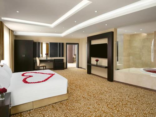 Movenpick Hotel Qassimにあるベッド