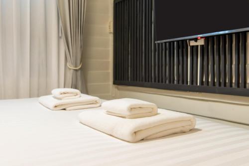 Postel nebo postele na pokoji v ubytování Resort Bangphlat