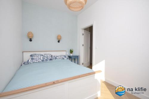 Katil atau katil-katil dalam bilik di Apartament na klifie - Łukęcin