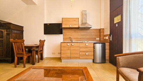 Kuchyň nebo kuchyňský kout v ubytování Zahara Sol Villas y Apartamentos by QHotels