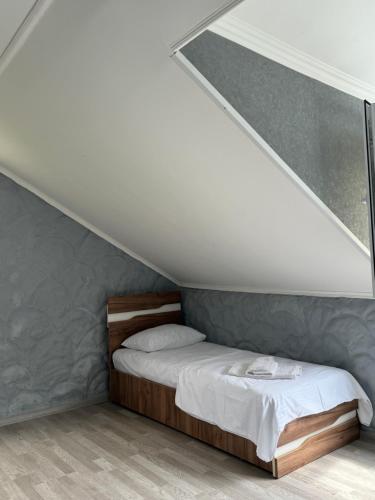 Una cama o camas en una habitación de Hagvi Resort