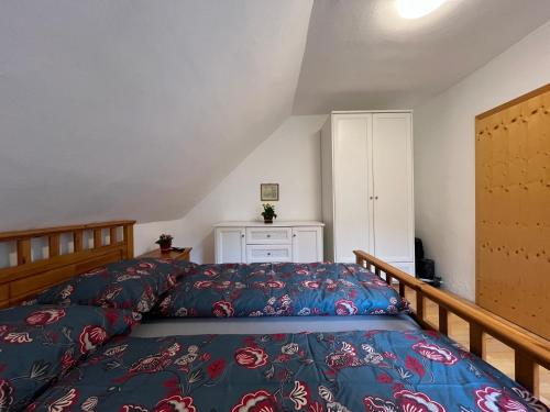 Postel nebo postele na pokoji v ubytování Sunside Apartments Gästehaus