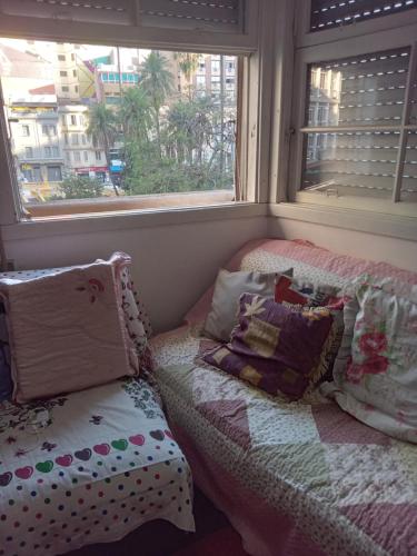 QUARTO PRIVADO COM INTERNETE PRÓXIMO A UFGSにあるベッド