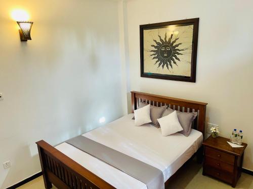 Katil atau katil-katil dalam bilik di Sand & Surf Guest House