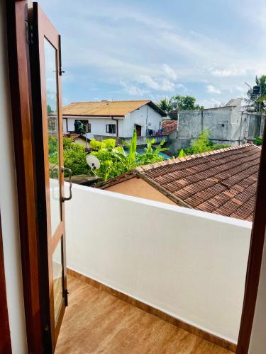 Balkoni atau teres di Sand & Surf Guest House