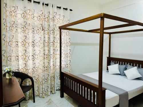 Katil atau katil-katil dalam bilik di Sand & Surf Guest House