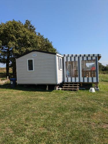 Clădirea în care este situat/ăcampingul