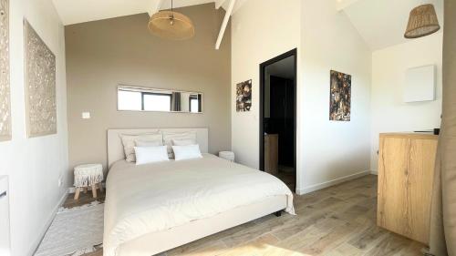 Ένα ή περισσότερα κρεβάτια σε δωμάτιο στο Chalet, Jacuzzi, Vue Panoramique