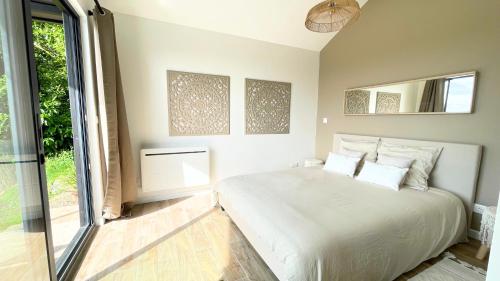 Ένα ή περισσότερα κρεβάτια σε δωμάτιο στο Chalet, Jacuzzi, Vue Panoramique