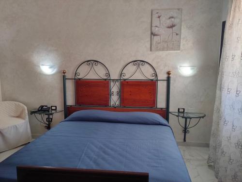 Postel nebo postele na pokoji v ubytování Grand Hotel Mosè