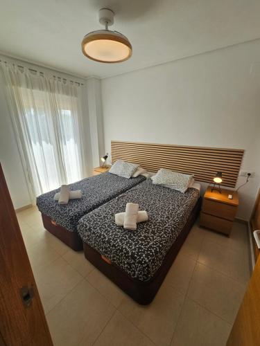 Postel nebo postele na pokoji v ubytování 2 chambres à coucher à Sucina