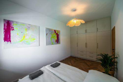 Postel nebo postele na pokoji v ubytování Apartament Mikołowska z Tarasem