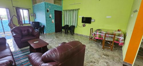Χώρος καθιστικού στο SHI's Gem Village Villa Retreat at Thanjavur