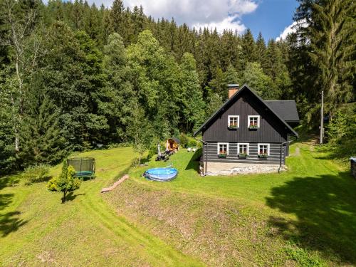 an aerial view of a house with a frisbee in the yard at Chalupa U Horníků in Vítkovice
