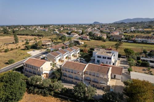 an aerial view of a town with houses at Oscar Hotel in Laganas