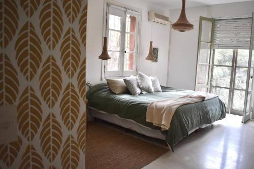 Ένα ή περισσότερα κρεβάτια σε δωμάτιο στο Akasha suites - Bed and Breakfast