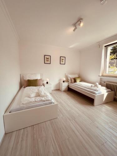 Postel nebo postele na pokoji v ubytování H6 XL I EG I Balkon I Küche I Wasch I 6P I Smart