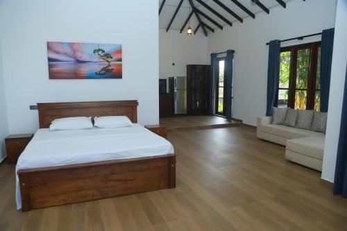 Ένα ή περισσότερα κρεβάτια σε δωμάτιο στο Villa Green Paradise