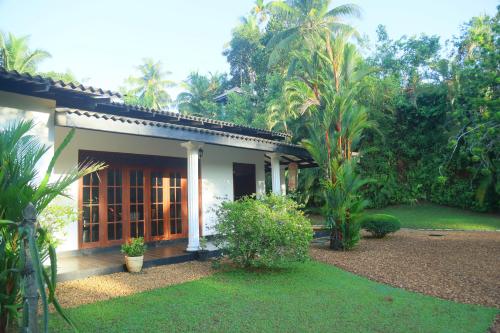 Κήπος έξω από το Villa Green Paradise