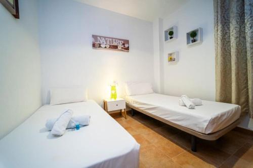 Postel nebo postele na pokoji v ubytování Comfortable and relaxing house in Bonalba