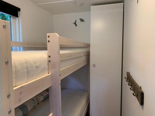Palanda nebo palandy na pokoji v ubytování Chalet op de Veluwe