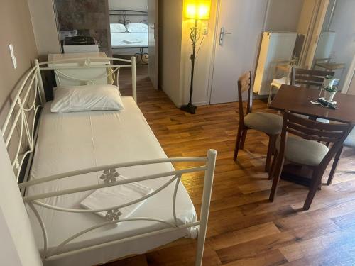 Cama o camas de una habitación en Hotel Διεθνές