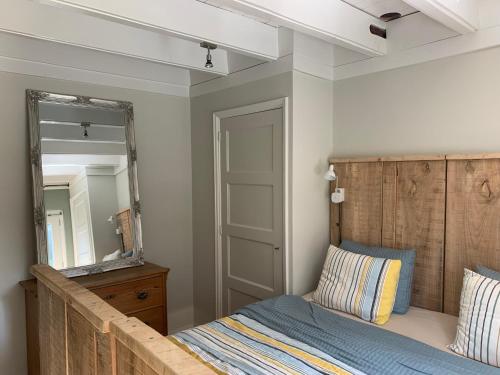 Ένα ή περισσότερα κρεβάτια σε δωμάτιο στο Luxe kamer centrum Sluis