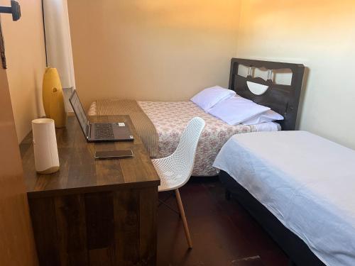 Ένα ή περισσότερα κρεβάτια σε δωμάτιο στο Hostel Diamante