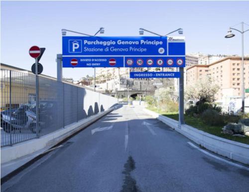 a street sign on the side of a road at Principe railway station in Genova