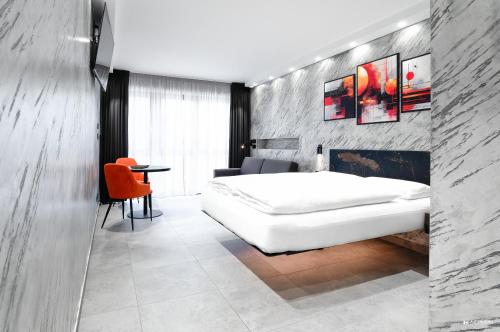Postel nebo postele na pokoji v ubytování ADV HOME - Exclusive Rooms