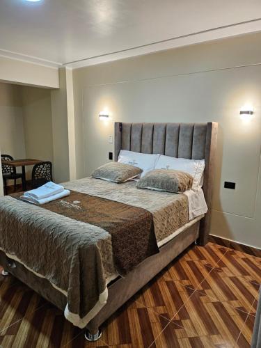 Ένα ή περισσότερα κρεβάτια σε δωμάτιο στο Hotel Sumac Samari