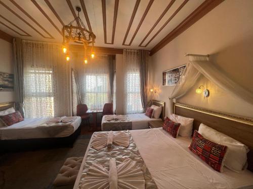 Postel nebo postele na pokoji v ubytování April Hotel