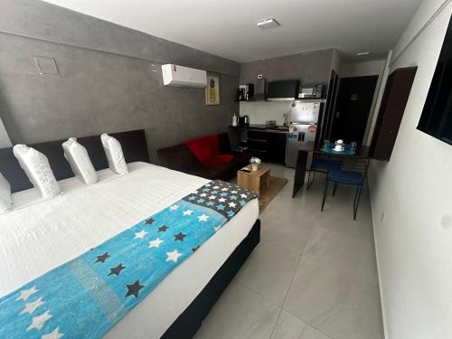 Edificio Bellini tesisinde bir odada yatak veya yataklar