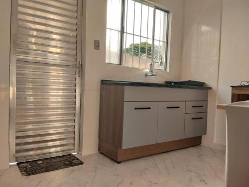 Dapur atau dapur kecil di Lar Aconchego