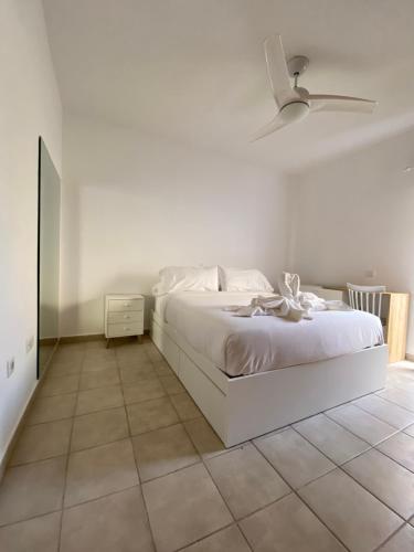 Postel nebo postele na pokoji v ubytování El Olivar Corazón Urbano