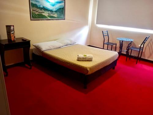 Postel nebo postele na pokoji v ubytování Greco Boutique Hotel